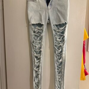 Women's Distressed Light Blue Jeans